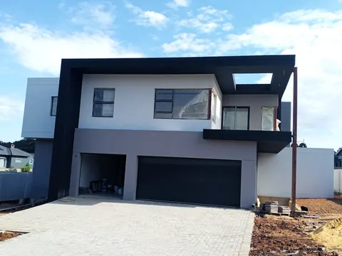 Finished modern double-storey house in grey and charcoal